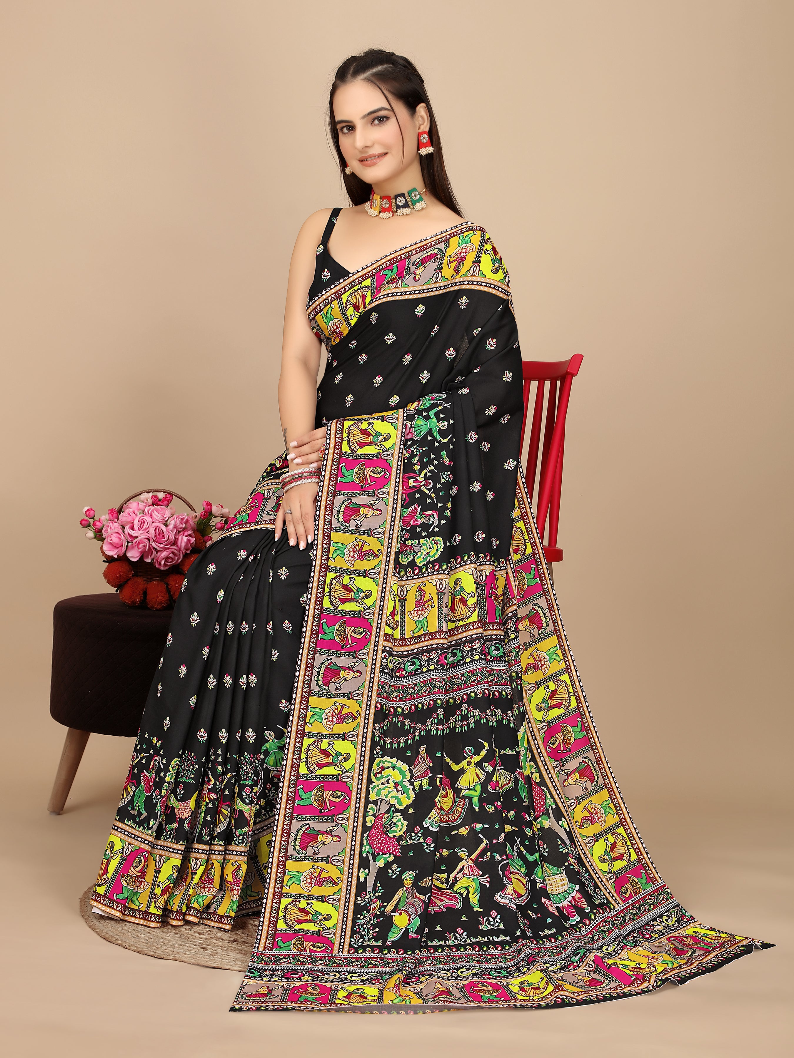 Traditional Black Saree with Patola Folk Art Motifs