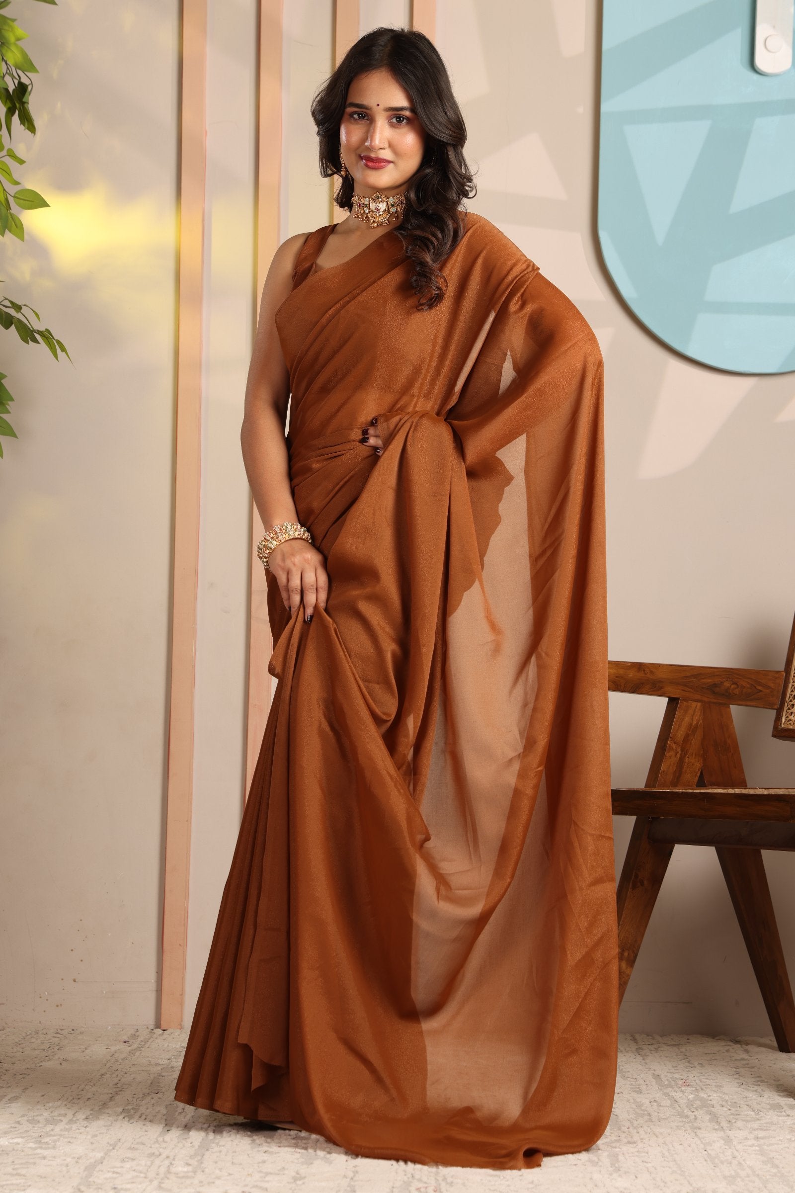Aradhya — Minimal Brown Plain Star Georgette Saree