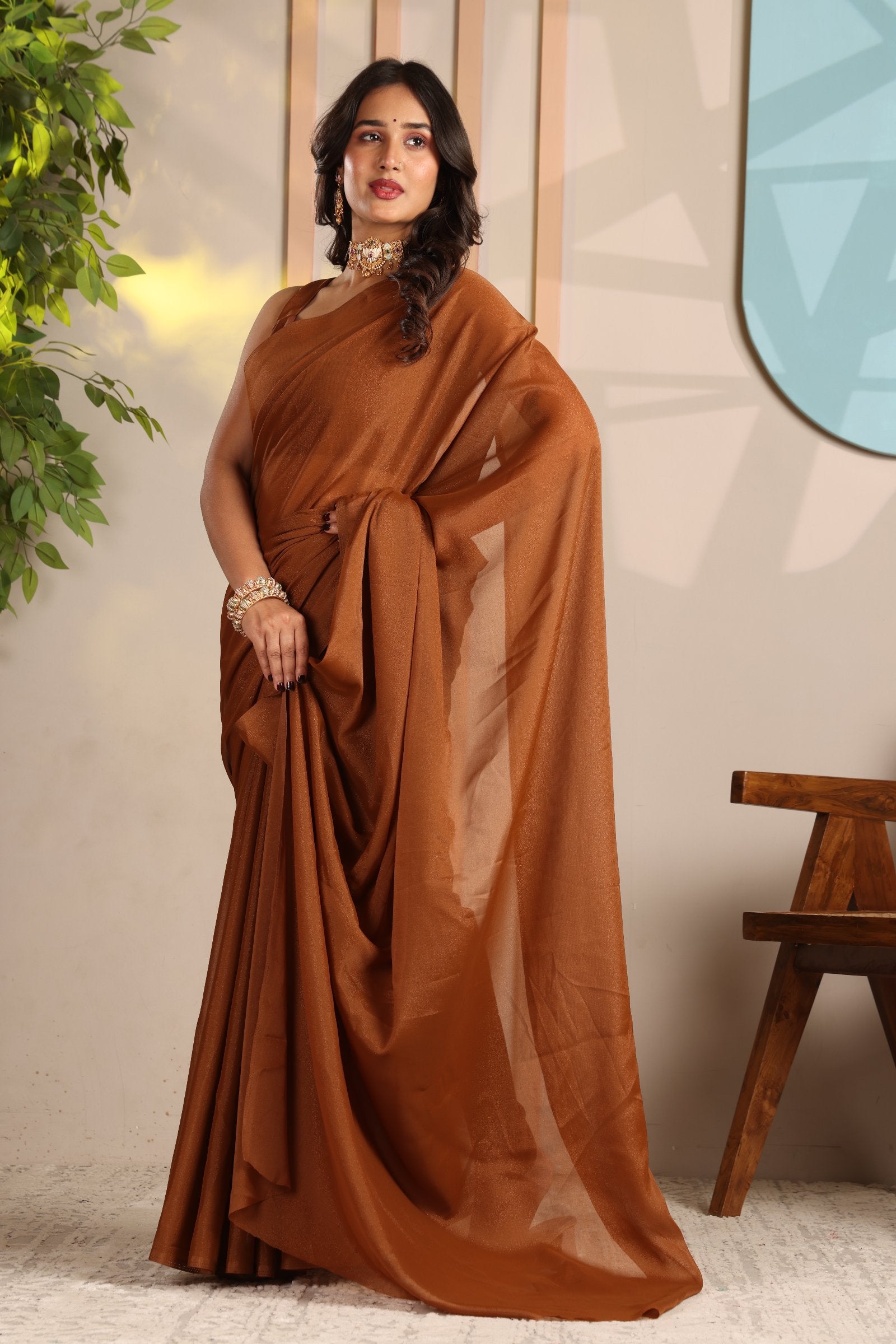 Aradhya — Minimal Brown Plain Star Georgette Saree
