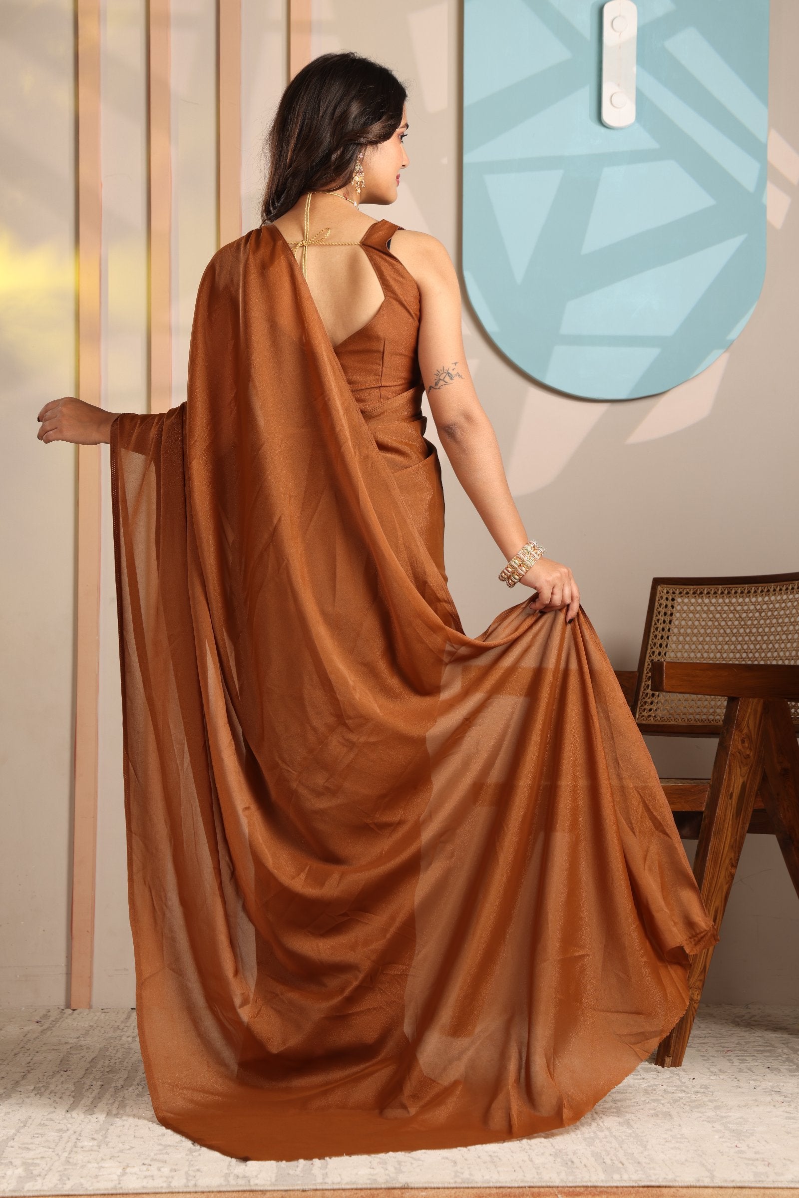 Aradhya — Minimal Brown Plain Star Georgette Saree