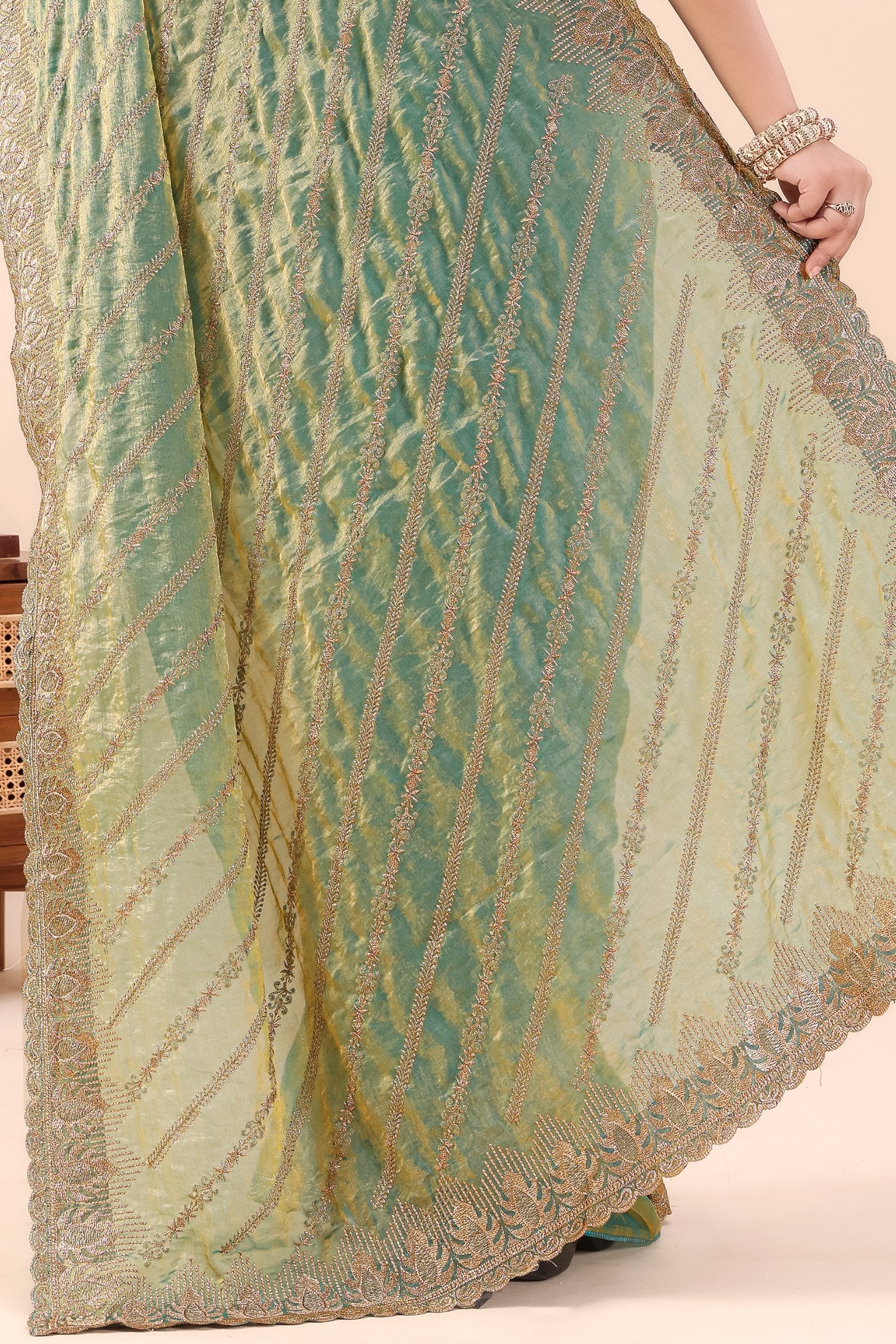 Sarayu — Green Frendy Satin Silk Zari Embroidered Saree